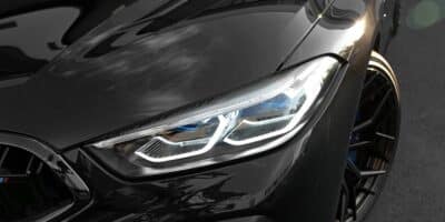 black bmw m8 pricing headlight and wheels
