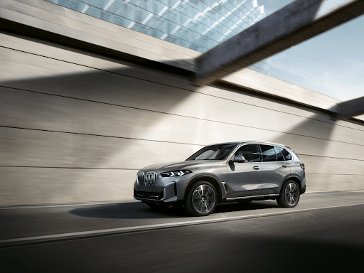 BMW x5 driving on the highway.